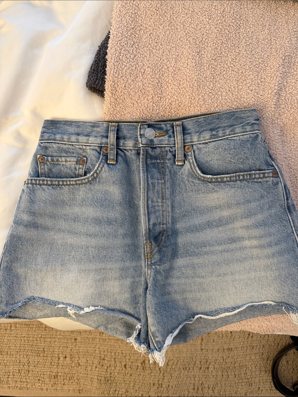 Re/Done Light Wash Denim Cutoff Shorts